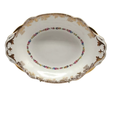 VINTAGE OVAL DISH WITH A SCOLLOPED RIM