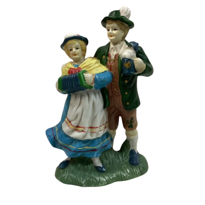 Antique porcelain German figurine of lovers celebrating Oktoberfest