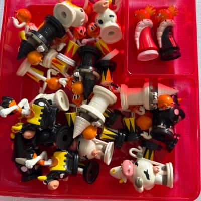 Vintage Chupa Chups Lollipop 3D Chess Collection game set.  The set was produced in Spain as a promotional item for the Chupa Chups brand, likely in the 1990s.The set in the includes the unique plastic pieces and a red storage tray(30 pieces).(B26)