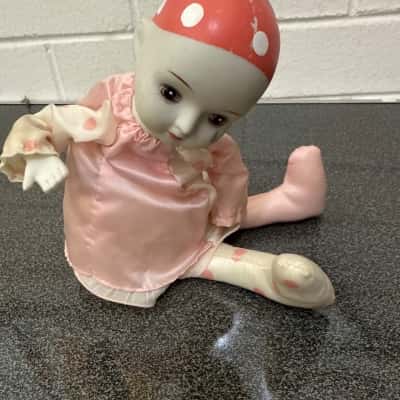 Small, vintage porcelain music box doll (B19)