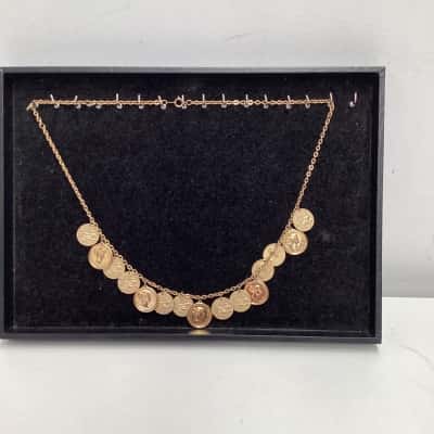  Womens Necklace Gold tone chain with multiple decorative coin charms 