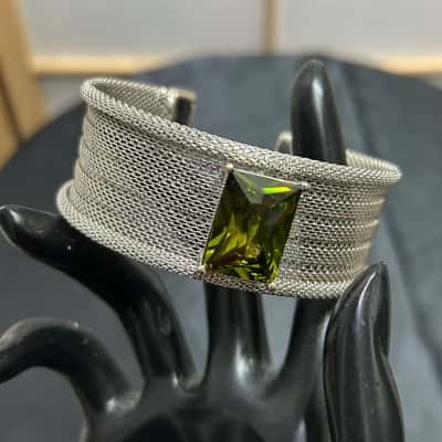 BUTLER Women's 1980s Vintage Silver Tone Mesh Cuff Bangle With Green Crystal  AS IS