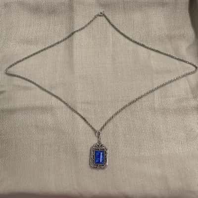  Womens Blue Stone and Silver Tone Pendant Necklace on Long Chain