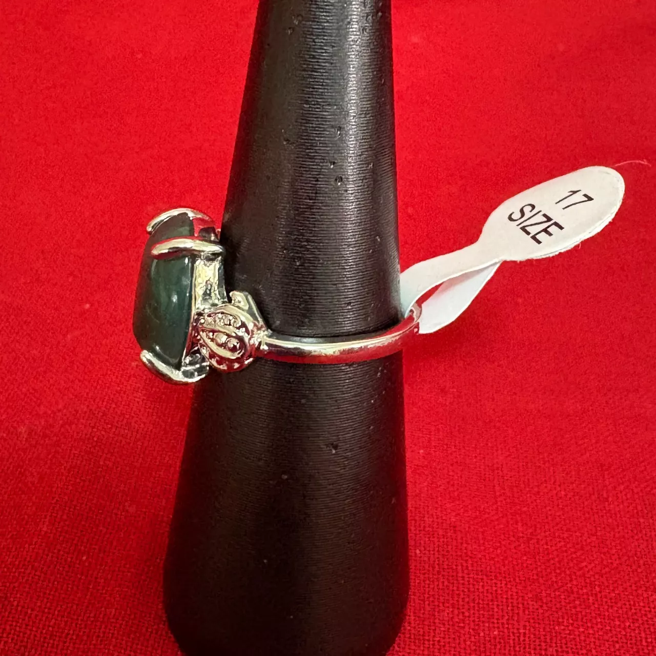 Women's Silver Tone Ring featuring a Polished Oval Shape Greenish Stone