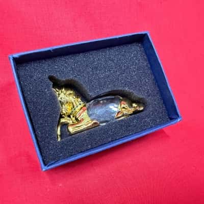 Gold tone Metal Unicorn heads and legs with a clear sparkling component serving as the body 