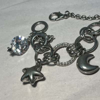 Silver tone Charm Bracelet, With Puffed Star and Moon Charms