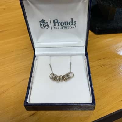Prouds the Jewellers, Womens silver Necklace  7 lucky rings friendship