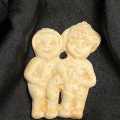 Vintage Off White Carved Stone Pendant Featuring Two People 
