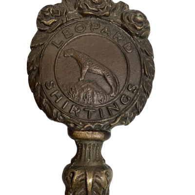 Antique Solid Brass Letter Opener "Leopard Shirtings". 1910