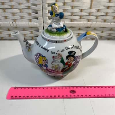 Alice in Wonderland” Mad Hatters Tea Party teapot by Paul Cardew