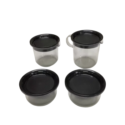Tupperware Four Piece Plastic Creamer & Sugar Pitcher Set With Black Lids