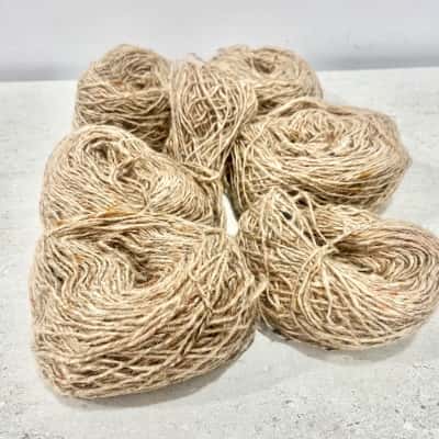6 plus Balls of Natural Wool 