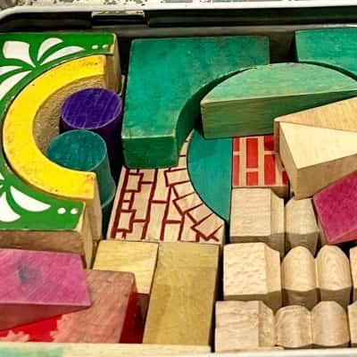 Vintage Wooden Building Blocks in Old Chocolate Tin