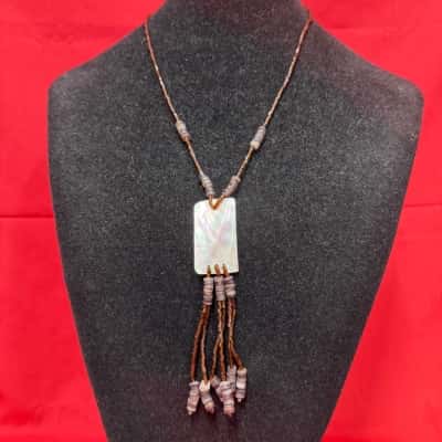 Womens Brown seed beads featuring a rectangular iridescent mother of pearl shell 