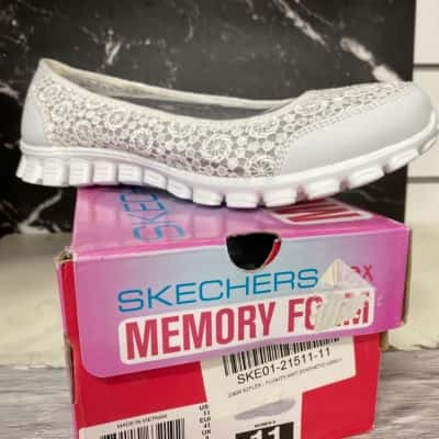 Skechers  Size 11 White slip ons new 