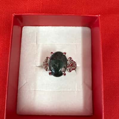  Women's Silver Tone Dress Ring featuring an Oval Cut Black Stone
