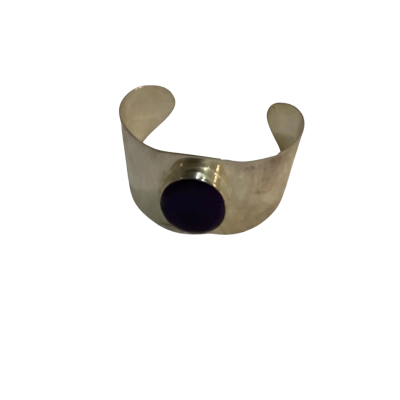 Silver tone cuff bangle with blue stone