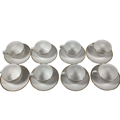 Maxwell and Williams White Gold 8 cups and saucers