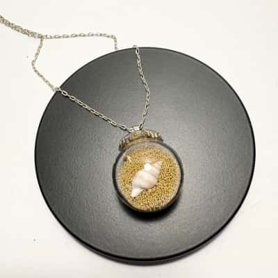 Unique Miniature Ocean Themed glass Globe Pendant filled with Gold Beads & sea Shell