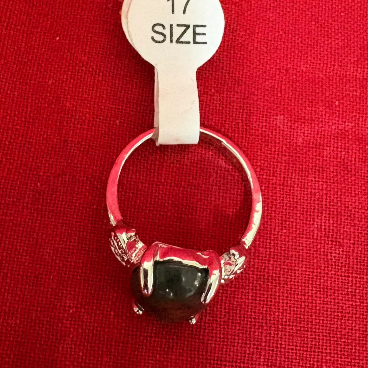 Women's Silver Tone Ring featuring a Polished Oval Shape Greenish Stone