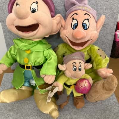 Three Disney plush toys