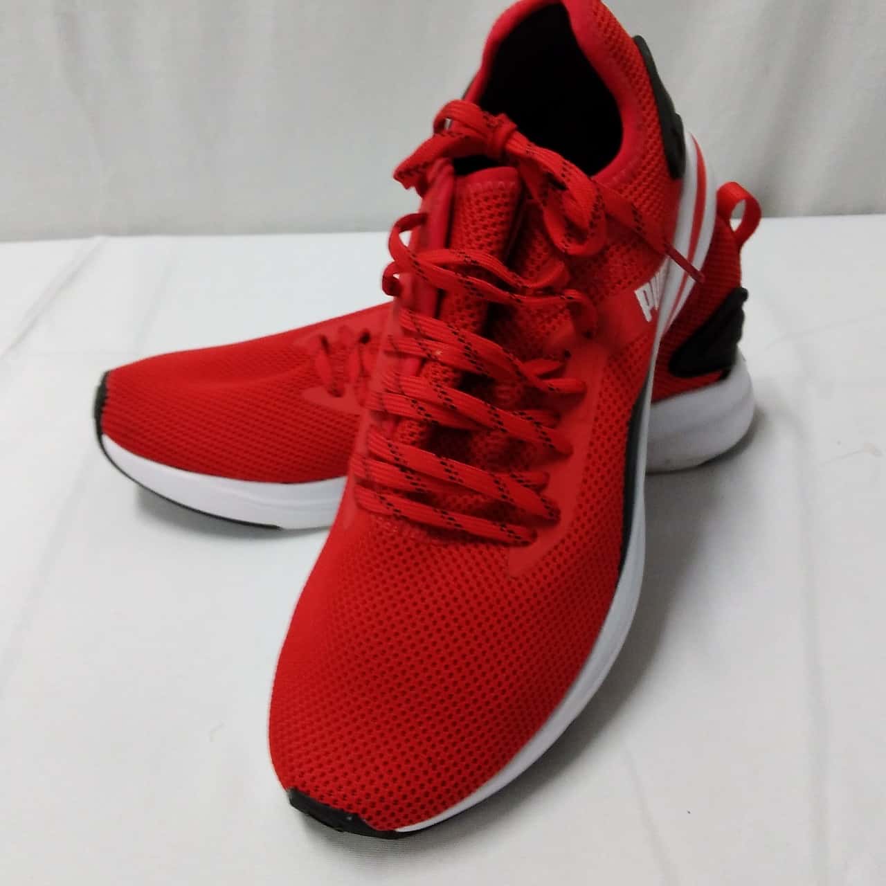 puma black red shoes