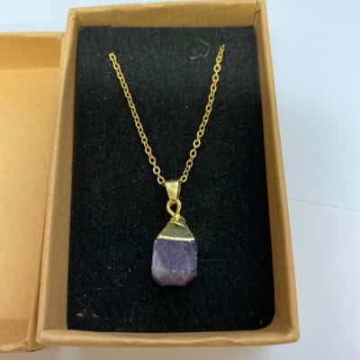  Womens Necklace Gold Tone  with a Purple Stone 