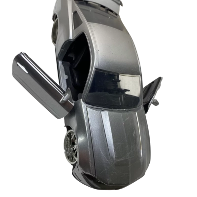 a silver 1:24 scale die-cast model car, specifically a Ford Mustang GT from the Jada Toys Big Time Muscle series.