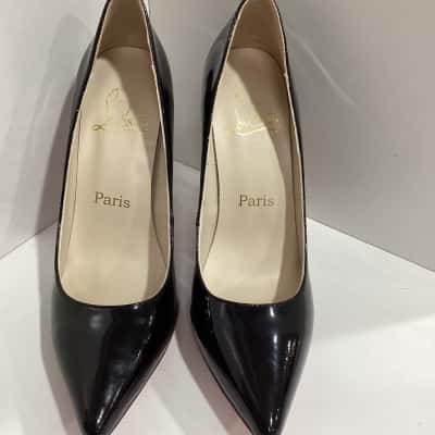 Appears to be C.Louboutin Womens Heels Black  / Red 