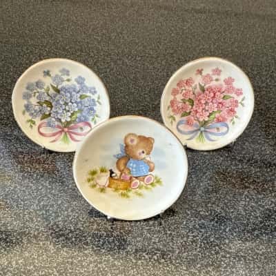 Small porcelain collectible plates, from the Reutter Porzellan "Reu2"and collectible plate Royal Kent bone china, featuring a teddy bear design.(B12)