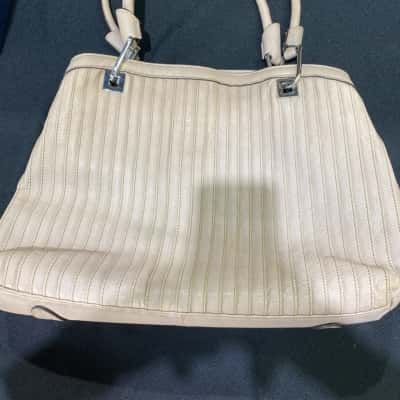 Phillip Charriol cream - coloured leather hand bag 