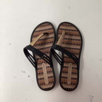  Womens Grendha black and gold US Size 6 Sandals 