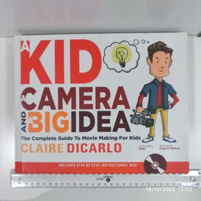 A Kid A Camera And A Big Idea Book And DVD Inside 