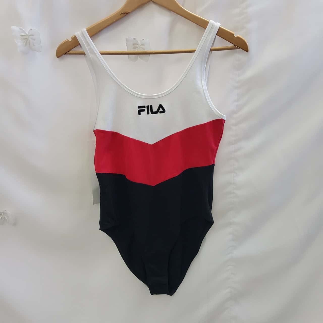 white fila bodysuit