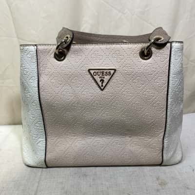 white and beige handbag is a Guess Noelle Small Noel Tote 30x25x15 cm