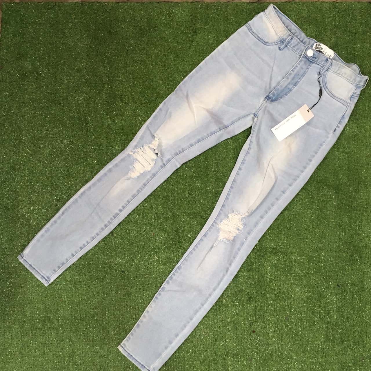 Skinny light blue distressed Jeans