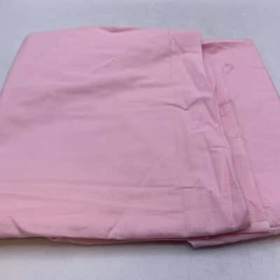 Cotton mix fabric.  102 x 150 cm approx.  plain baby pink.