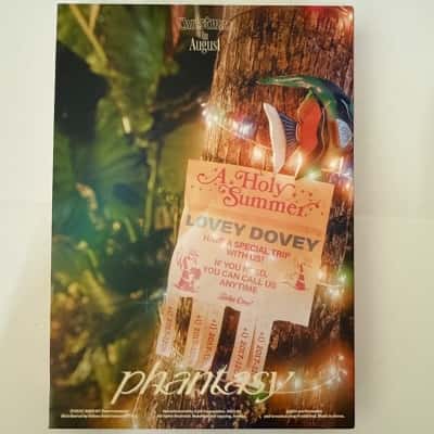 Two versions of THE BOYZ's second full album, Phantasy Pt.1: Christmas in August, the albums were released on August 7, 2023, the two versions pictured appear to be the "Holiday" and "Present". Each album version includes a 64-page photobook,CD-R(B15