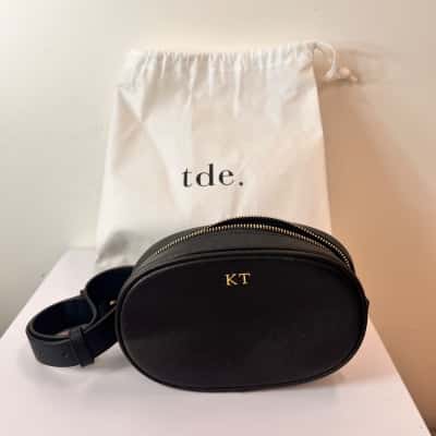 The Daily Edited TDE Black Saffiano Leather Monogram Belt Bag