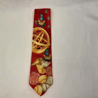 Leonard Paris Luxury Silk Tie Featuring a Vivid Red Background with Repeating Print Pattern