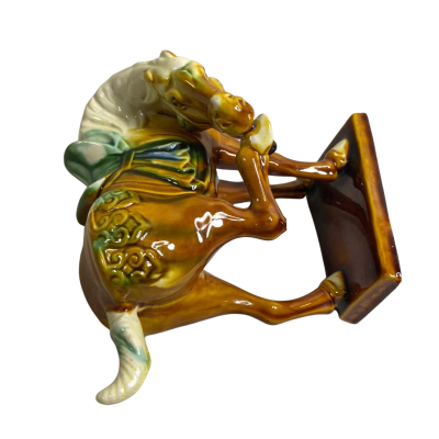 vintage Chinese Tang Dynasty style ceramic horse figurine, often referred to as a "Tang Sancai" horse,