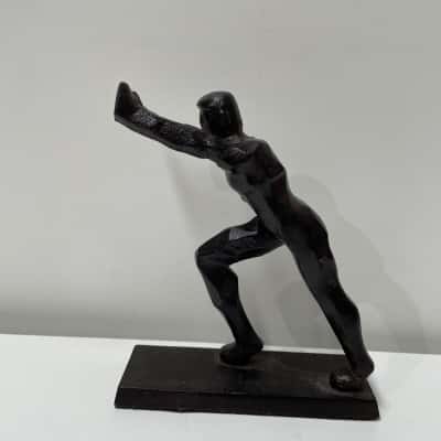 Metal man sculpture book end