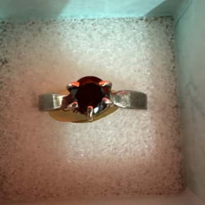  Women's 925 Silver Ring featuring a Round Deep Red Stone in a Prong Setting