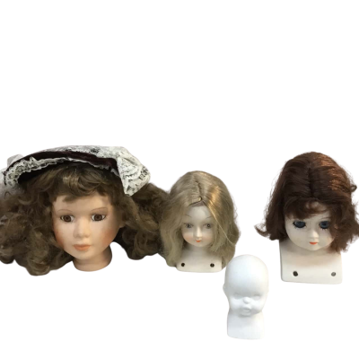 Porcelain Doll Heads as pictured 