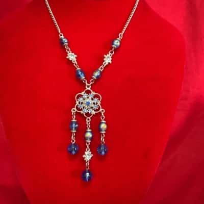  Women's Silver Tone Blue Beaded Necklace featuring a Floral Bead Centre