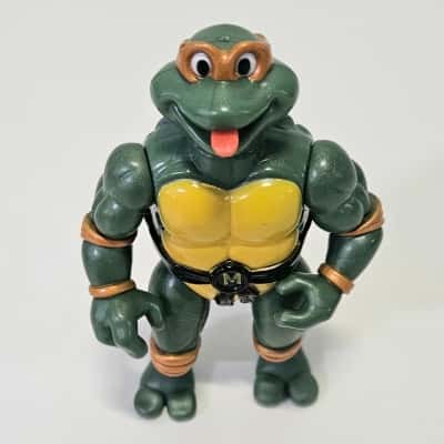 Vintage 1992 TMNT Michelangelo Playmates Figurine with Accessories.
