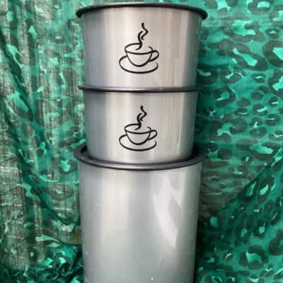 Tupperware  One-Touch Canisters.