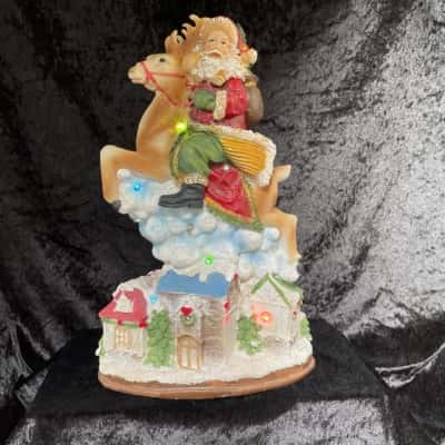 Christmas Statue with Multicoloured Lights.