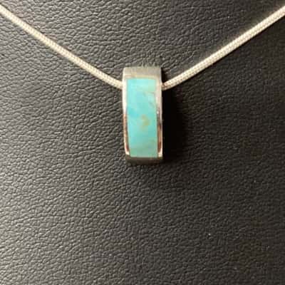 Sterling silver chain and pendant 