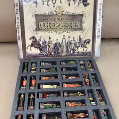 Fantastically intricate chessmen, board game pieces